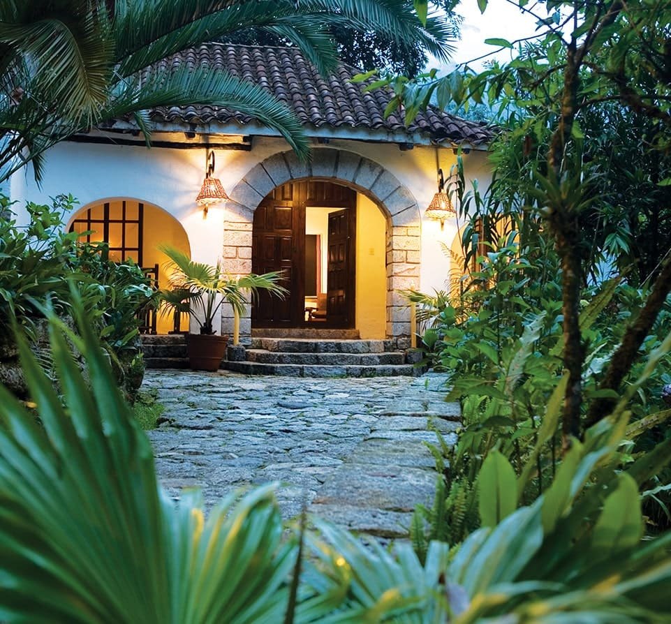 A lantern-lit casita entrance at Inkaterra Machu Picchu Pueblo
