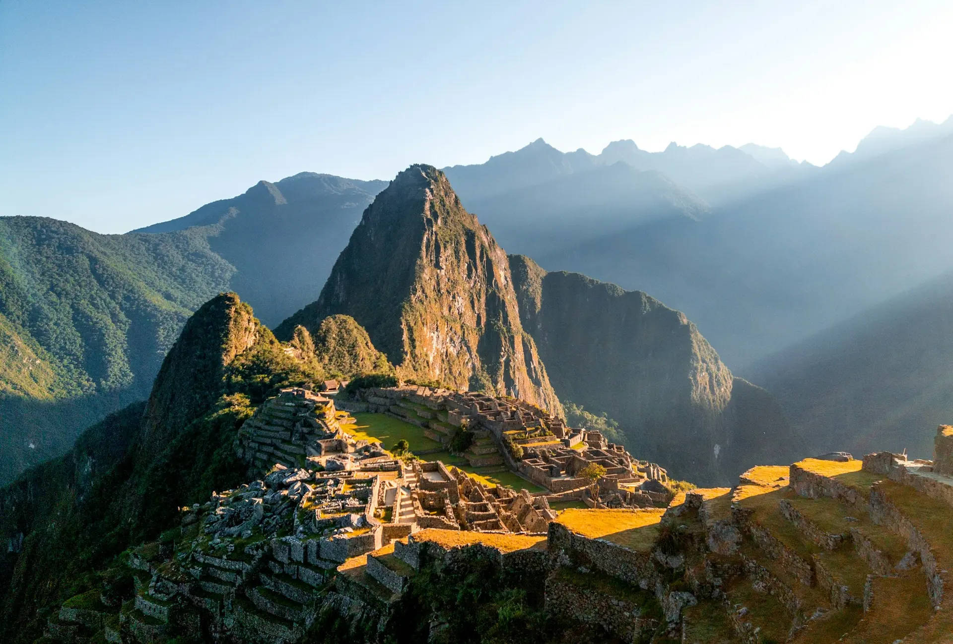 First light over Machu Picchu and its mountain ridges
